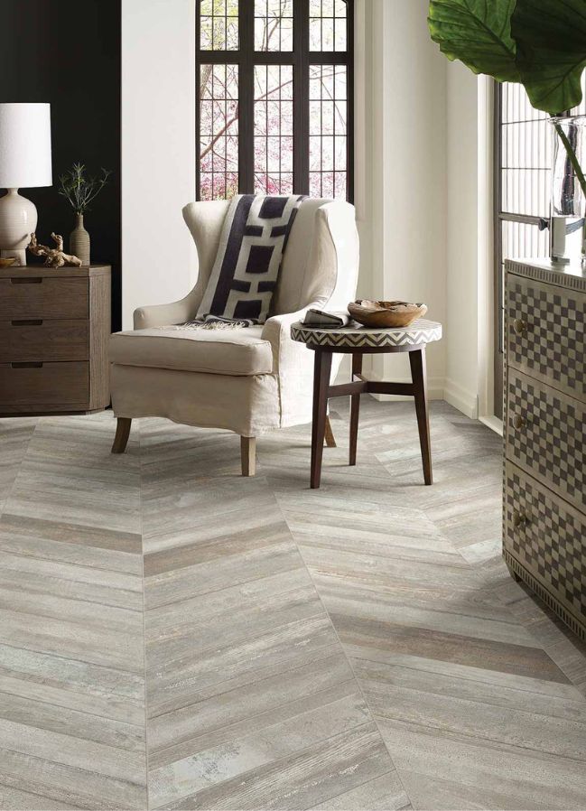 wood look tile flooring in a bright and stylish living room